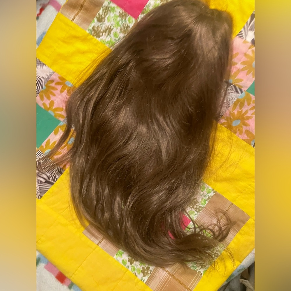 Dominique hair topper made in Hong Kong.